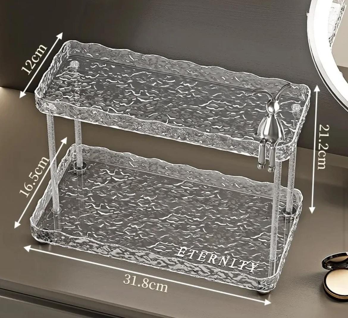 Two tier crystal-like makeup organizer.