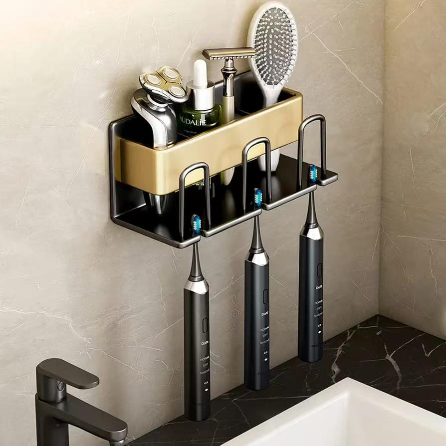 Metallic wall mounted tooth brush/paste holder.