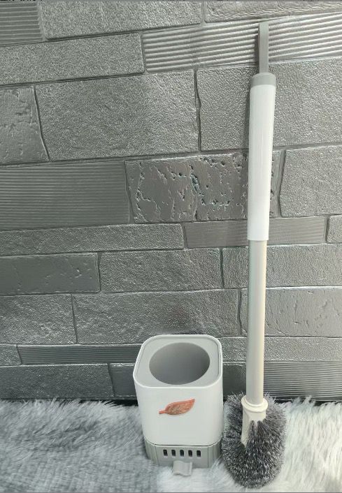 Wall mounted toilet brush cleaner