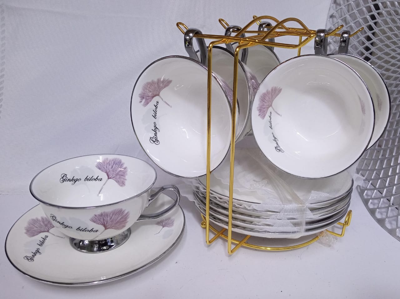 Cup and Saucer Pink Biloba With Stand