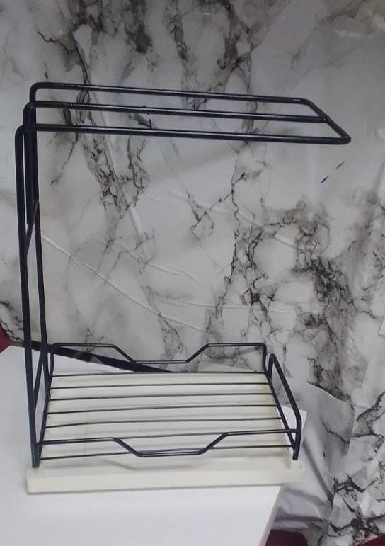 Metallic sink caddy with draining tray