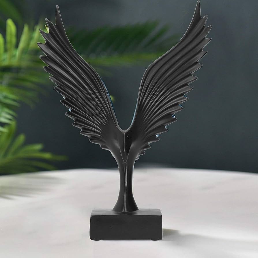 modern black and silver resin eagle wing sculpture mounted on a rectangular base