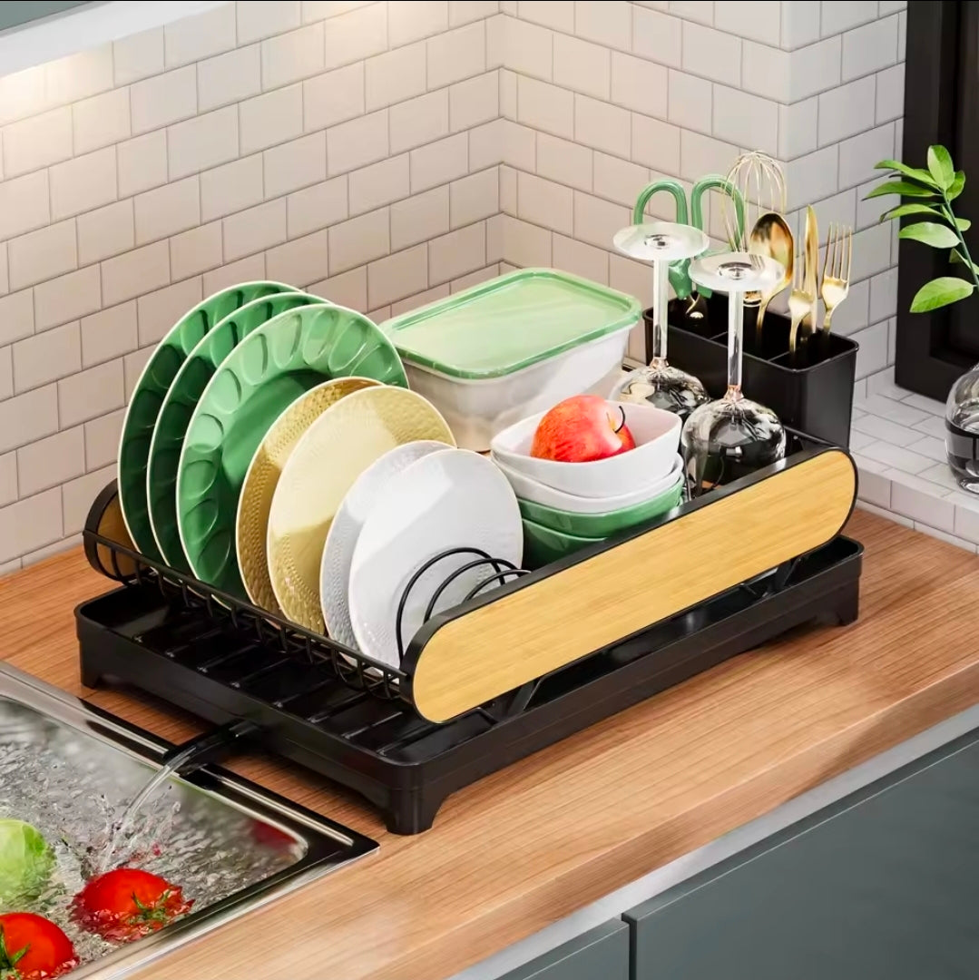 Compact countertop dish drying rack with a modern black and wood-grain design