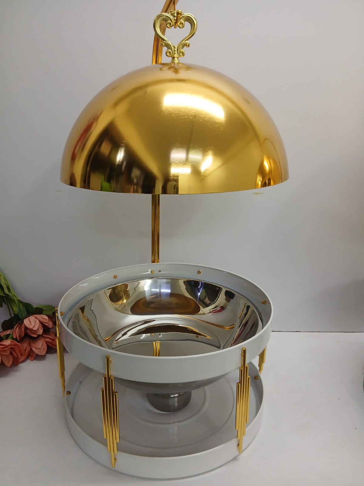 Golden fancy elegant chaffing dishes with hanging lid