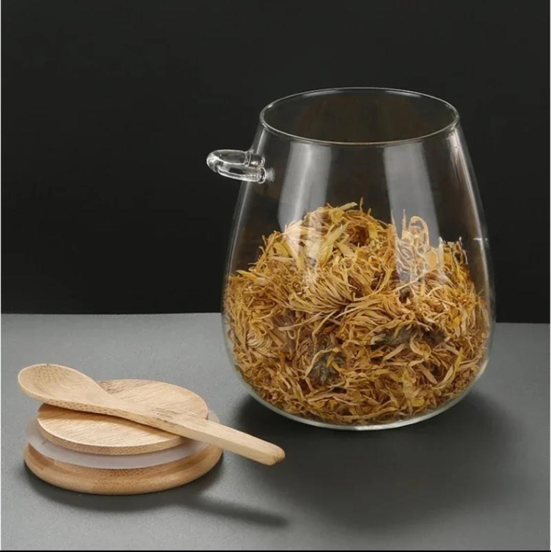 Glass storage canisters with Bamboo spoon and airtight lid.