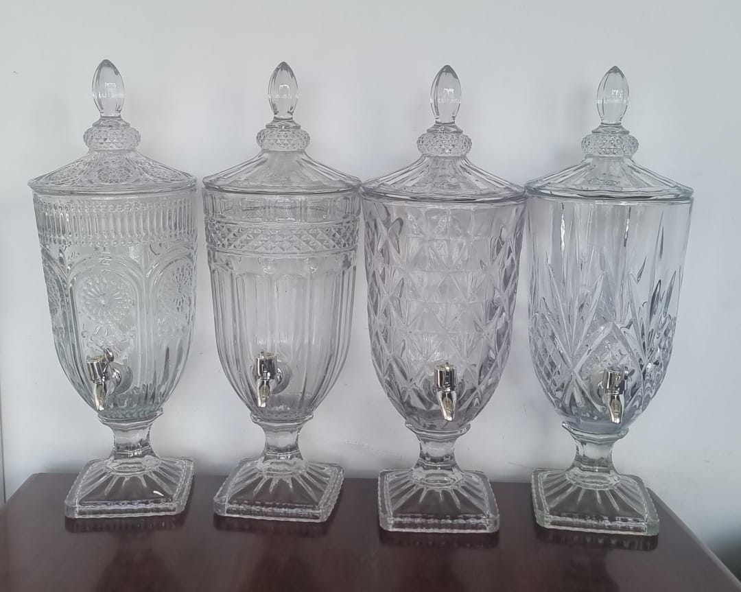 Cooling Spherical wine juice or liquid dispenser with ice slot and separator