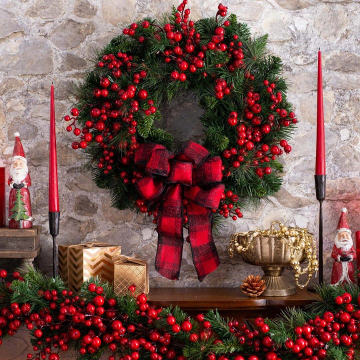 Christmas Red wreath front door hanging with decorations