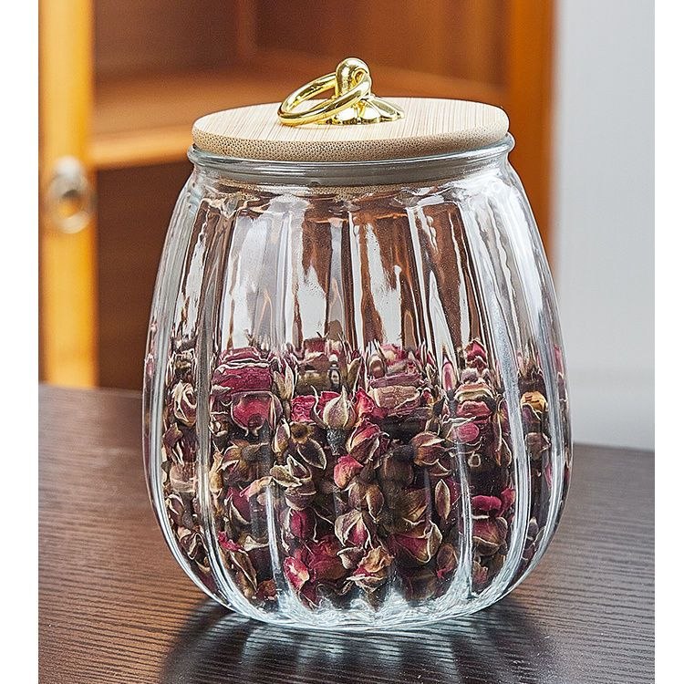 Ribbed glass storage jar