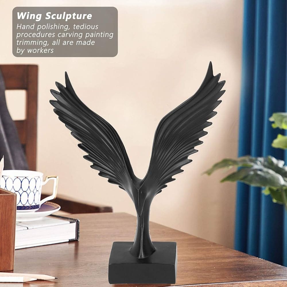 modern black and silver resin eagle wing sculpture mounted on a rectangular base