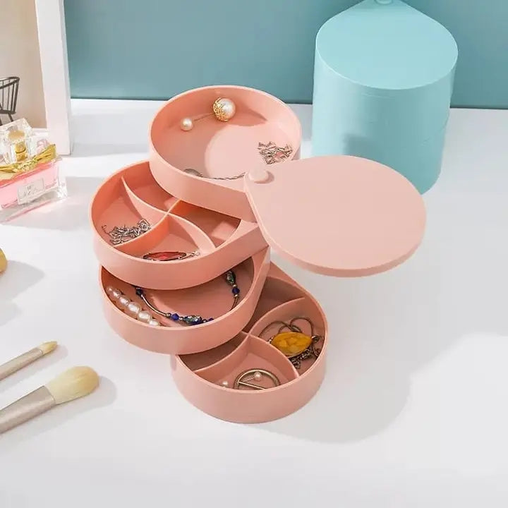 Keep your jewellery organized and simple to find, away from dust and liquids by getting yourself this 4 layer 360 rotating jewellery storage organizer . Available in blue, pink and white colours
