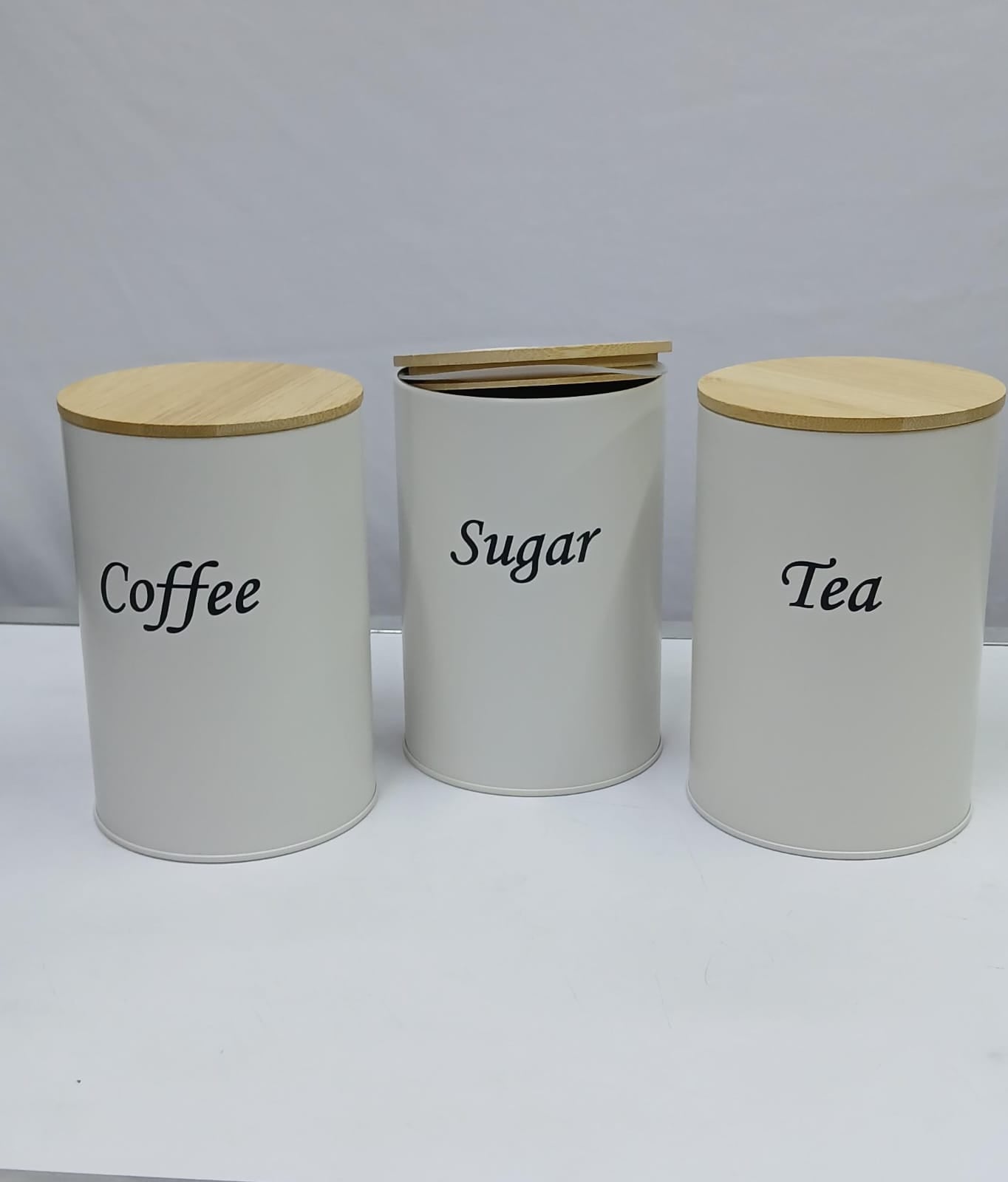 Coffee, Sugar & Tea Alloyeyal canisters with a bamboo lid