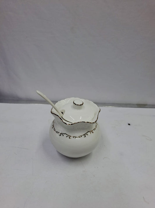 Gold rimmed sugar dish