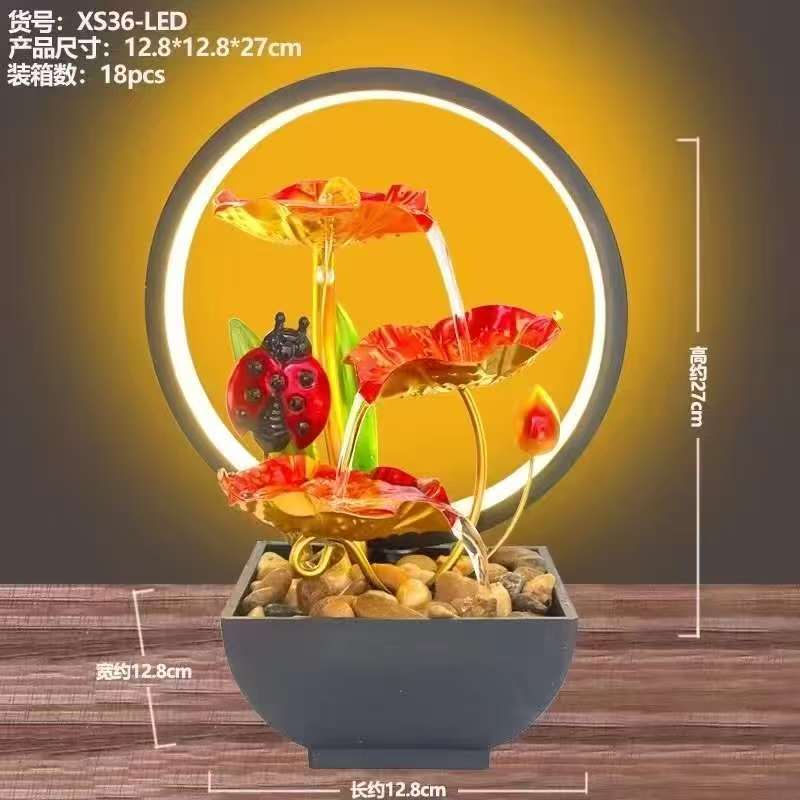 Elegant LED Electric mini water fountain in a clear glass pot