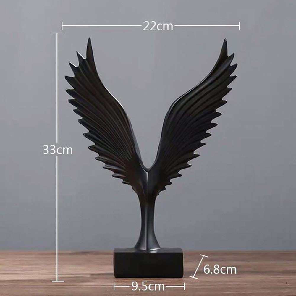 modern black and silver resin eagle wing sculpture mounted on a rectangular base