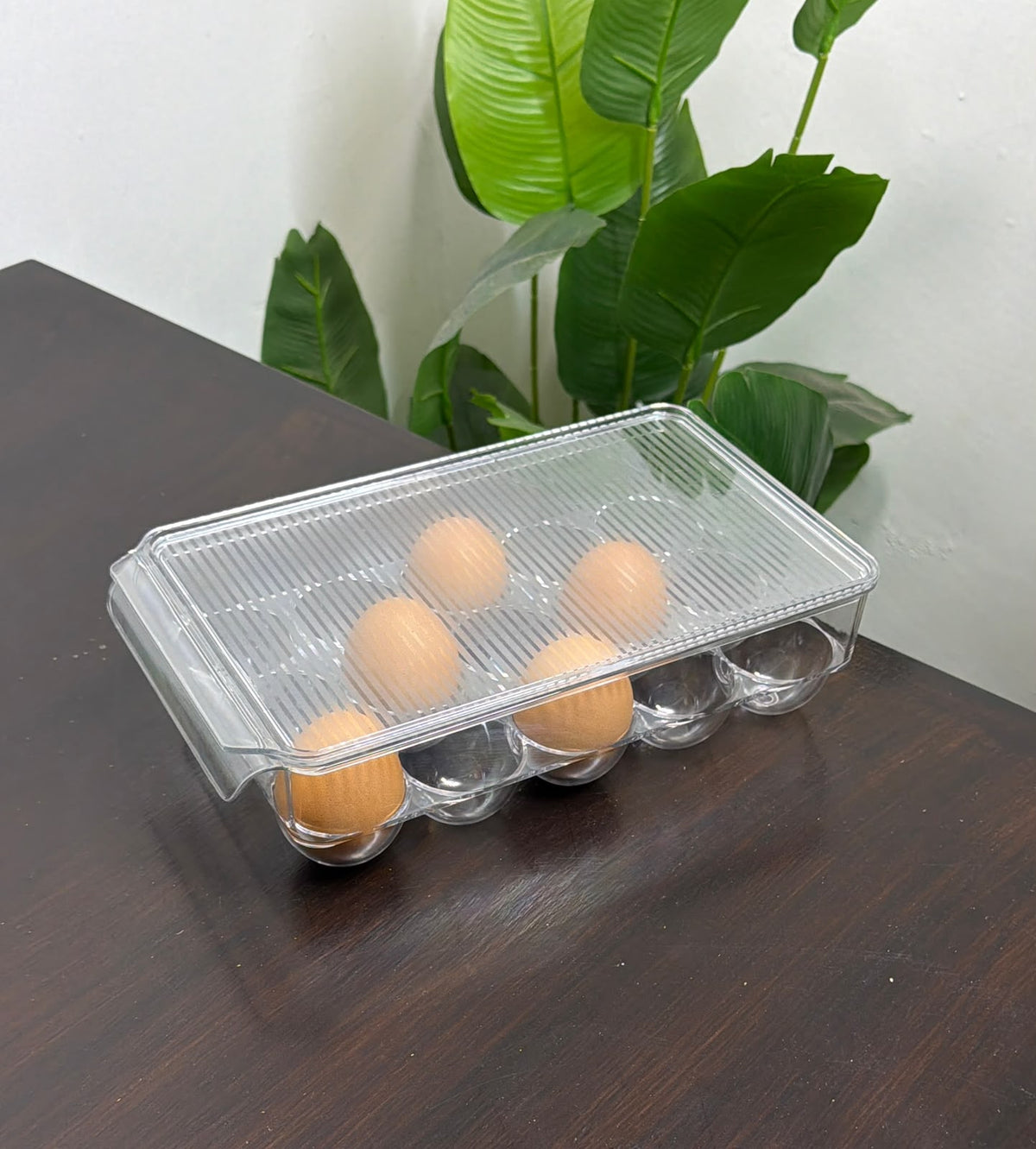 Clear acrylic egg storage container.