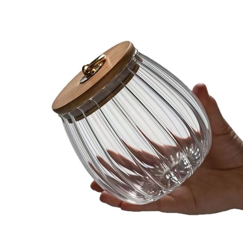Ribbed glass storage jar