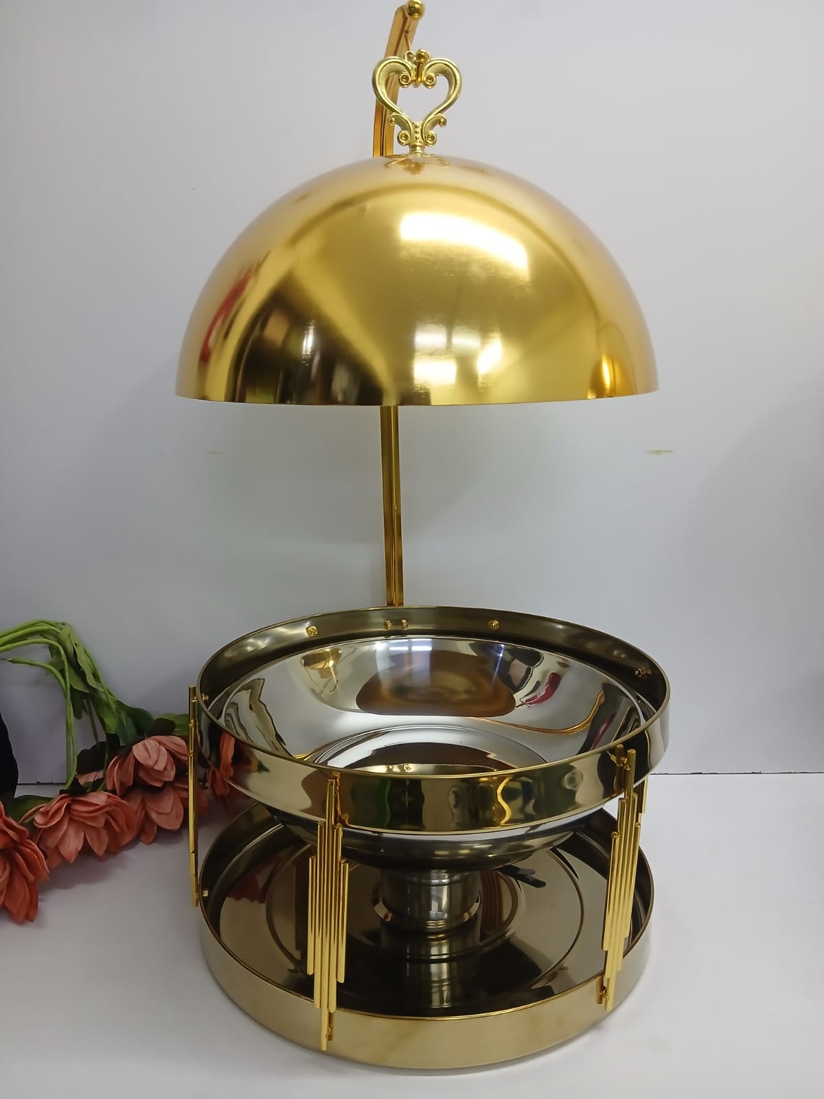 Golden fancy elegant chaffing dishes with hanging lid