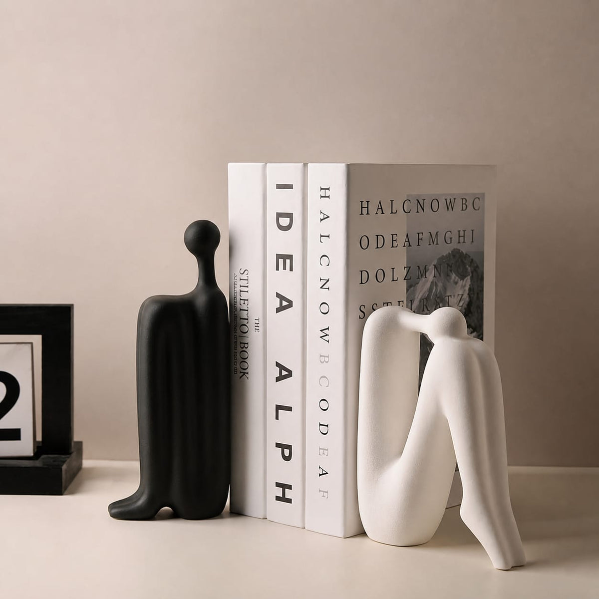 Modern minimalist back to back abstract figure ceramic bookends
